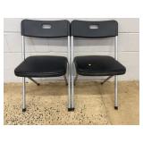 2 Black Folding Chairs by Cosco