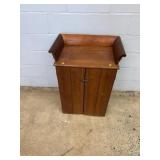 Wooden Cabinet With Raised Back And Side Rims