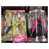 4 Barbie Dolls