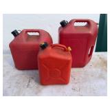 3 Red Plastic Gas Cans Assorted Sizes