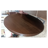50' ROUND OAK DINING TABLE..