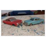 OLDER TIN FRICTION CORVAIRS.. CHOICE