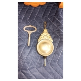 HAS KEY & PENDULUM..