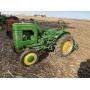 John Deere LA with one row cultivator. Runs good