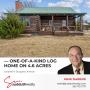 ONE-OF-A-KIND LOG HOME ON 4.6 ACRES