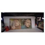 2 Disques vinyle 33 tours légèrement égratignés