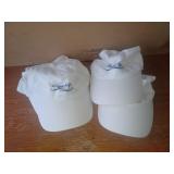 4 Casquettes neuves