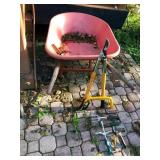 Wheelbarrow and gardening tools