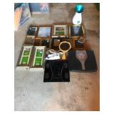 Variety of picture frames, scales, and face steame