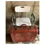 Bathroom shower chair and suitcase