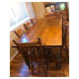 84x40x31 wooden dining room table and 8 chairs