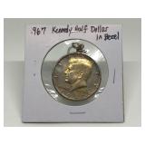1967 KENNEDY HALF IN BEZEL