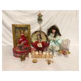 Collection of porcelain holiday dolls and angel