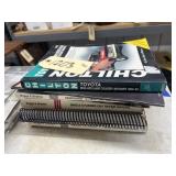 Pile of Engine Repair Manuals