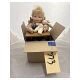 Porcelain Doll in High Chair