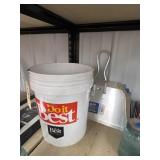 Caulk Gun & Practice Golf Balls in 5-Gal Bucket