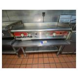 Champion 4-Burner Flat Top Grill on Table