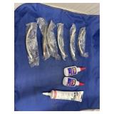 Box of Cabinet Handles - Caulk - Wood Adhesive