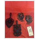 2 - Cast Iron Trivets & 2 Wall Hangers