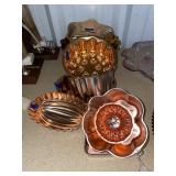 Pile of Copper Jello Molds