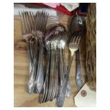Pile of Dinner Forks & Spoons