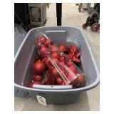 Red Christmas Ornaments in Plastic Bin