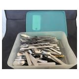 Silverware in Tupperware Container