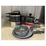 Pile of Assorted Cookware & Lids