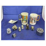 2 plastic circus cup, carved elephant figurines