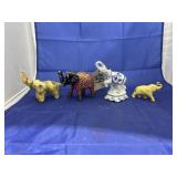 4 pcs. of assorted elephant figurines