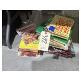 2 Stacked of Assorted Cookbooks