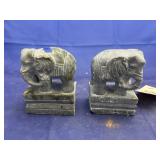 2 decorative carved elephants