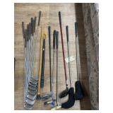 Pile of asstd. Golf clubs