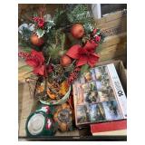 Box of holiday dï¿½cor, jigsaw puzzles, board game