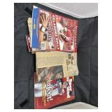 Stack of newspaper clippings & Sports Illustrated