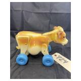 Plastic Rolling Cow Toy