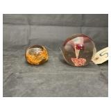 2 decorative glass paper weights