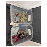 2 plastic bins w/ asstd. Costume jewelry