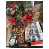 Box of holiday dï¿½cor, jigsaw puzzles, board game