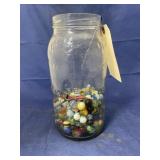 Glass Jar w/Assorted Marbles