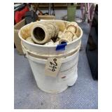 Assorted PVC Couplings in Plastic Bucket