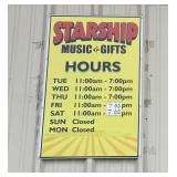 Starship Music & Gifts Operating Hours Sign