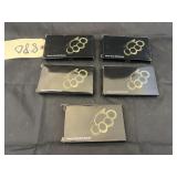 5 pairs of brass knuckles