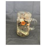 Coins in Glass Mug