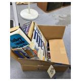 Assorted Books & Graduation Cap & Gown