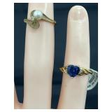 2 -10K rings 2.2 gr w/dia & sythentic sap & 2.3 gr