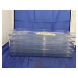Stack of Clear Plastic Trays