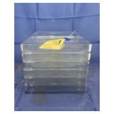 Stack of Clear Plastic Trays