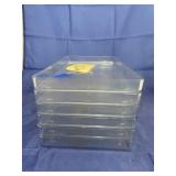 Stack of Clear Plastic Trays