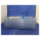 Stack of Clear Plastic Trays
